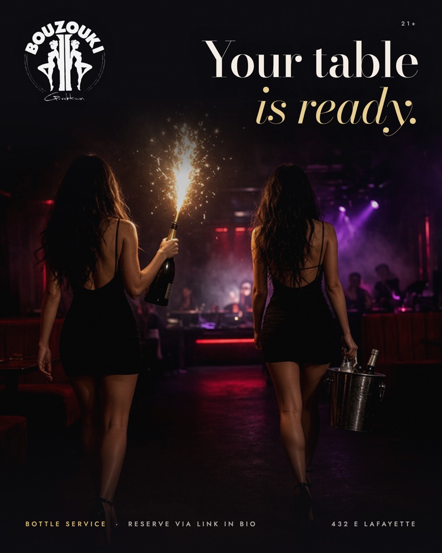 Your table is ready. Bottle service with a sparkler, carried to the booth.